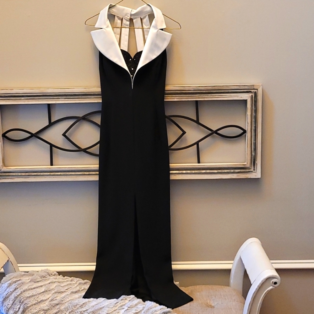 Form black tuxedo long gown in size 4. Gently worn.